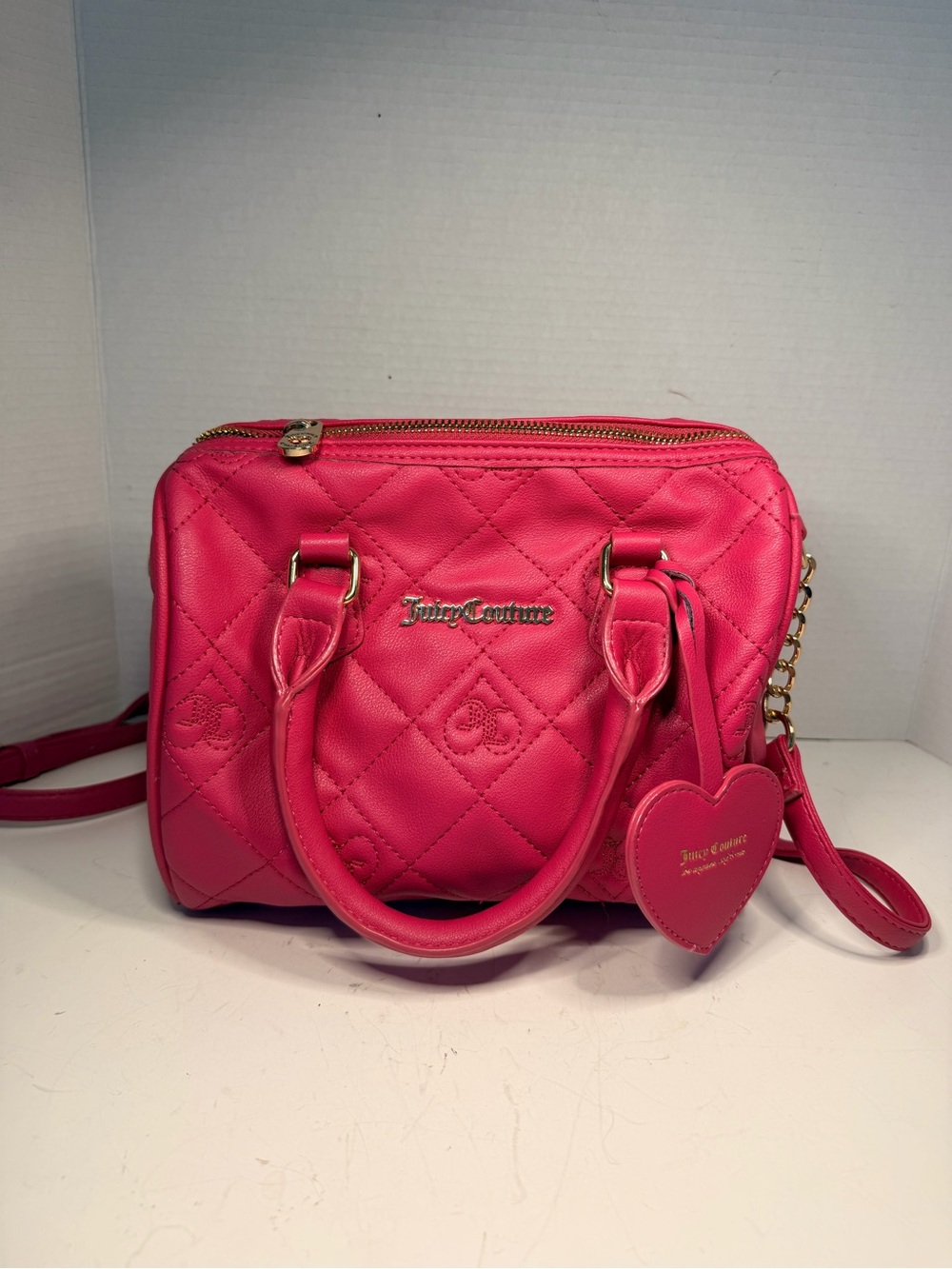 Juicy Couture Hot Pink Quilted Barrel Satchel
Crossbody Bag